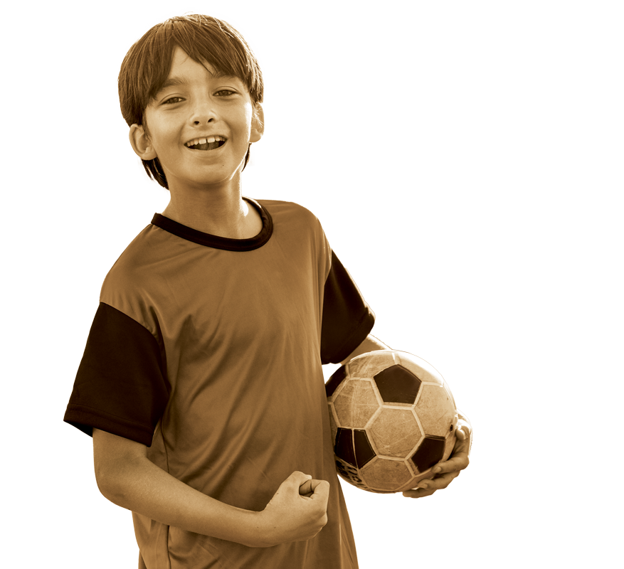 child holding soccer ball