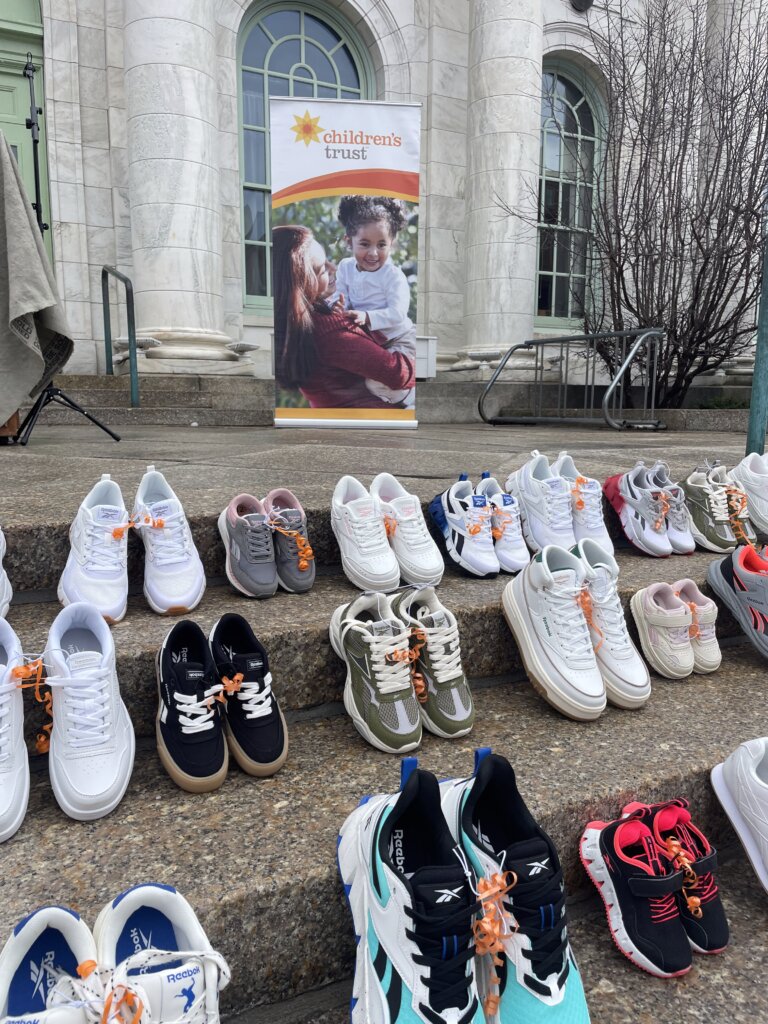 display of children's shoes outside