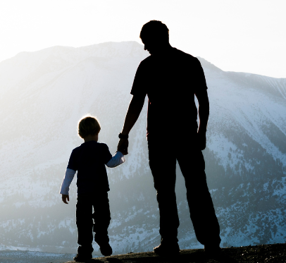 shadow of father holding child's hand
