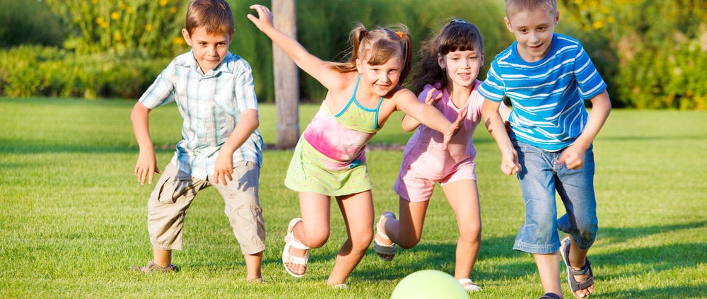 kids playing with a ball outside