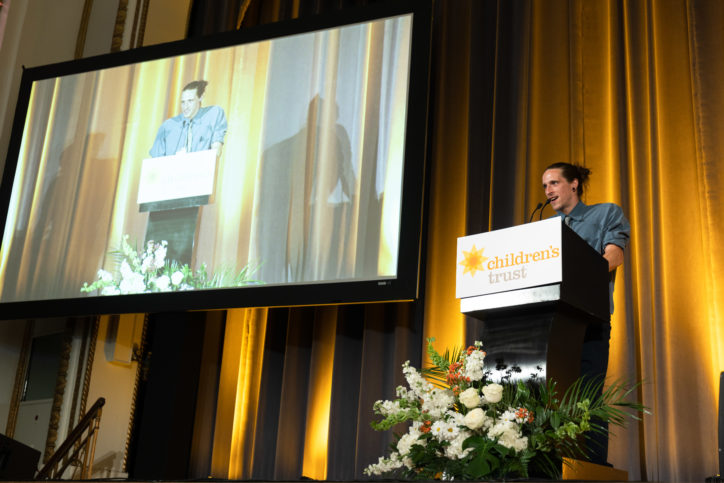 man presenting on stage
