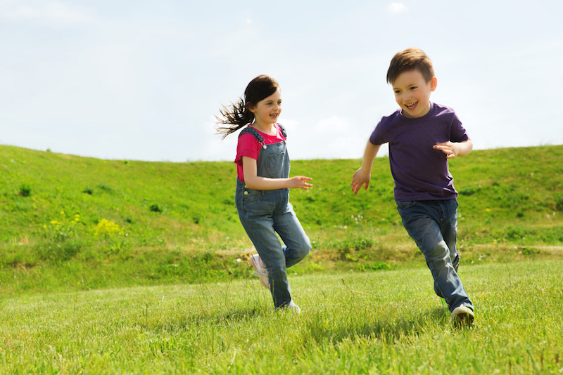 Two kids playing outside