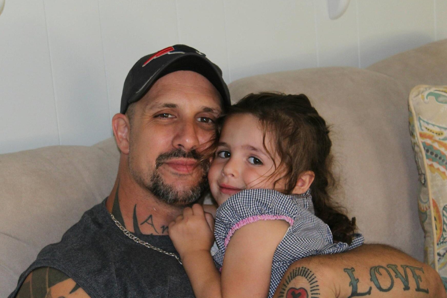 Mike holding Haley both smiling