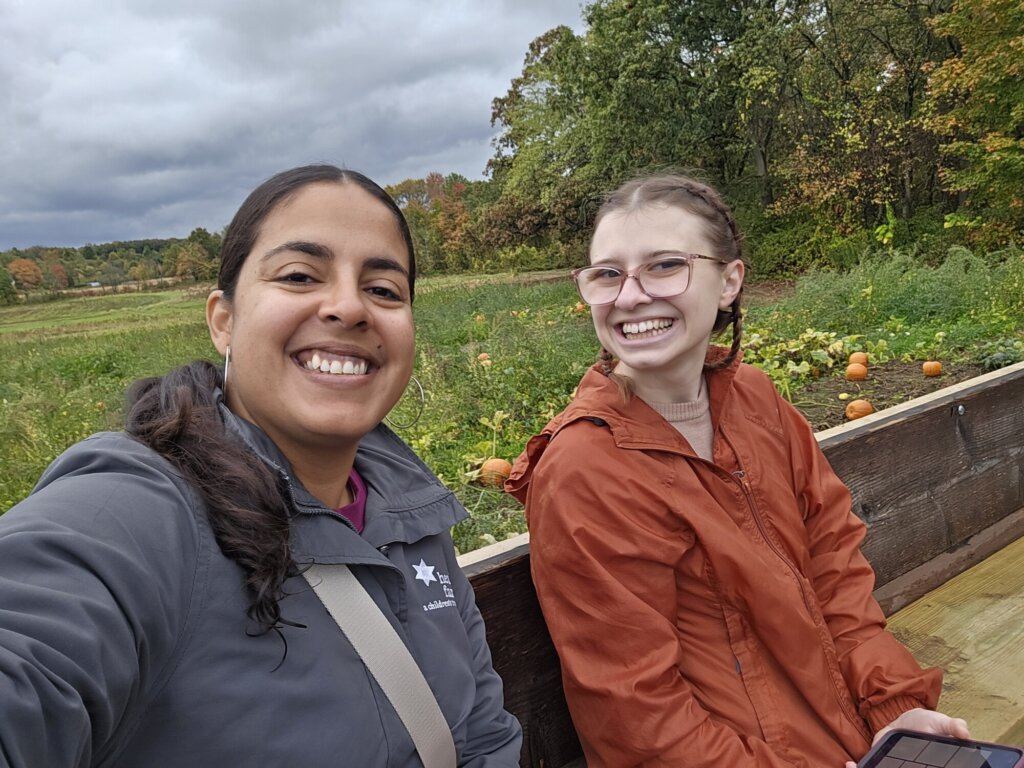 Jessica Ortiz, Healthy Families Program Coordinator alongside a young mom participating in the Healthy Families MA program.