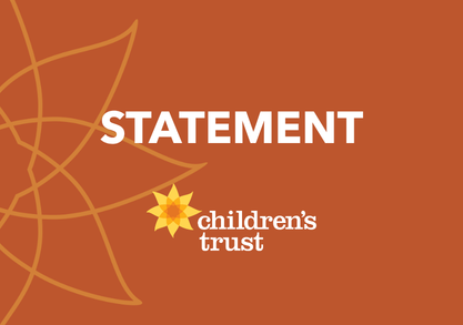 Orange background with a light geometric flower pattern, white text reading STATEMENT, above the Children's Trust logo.